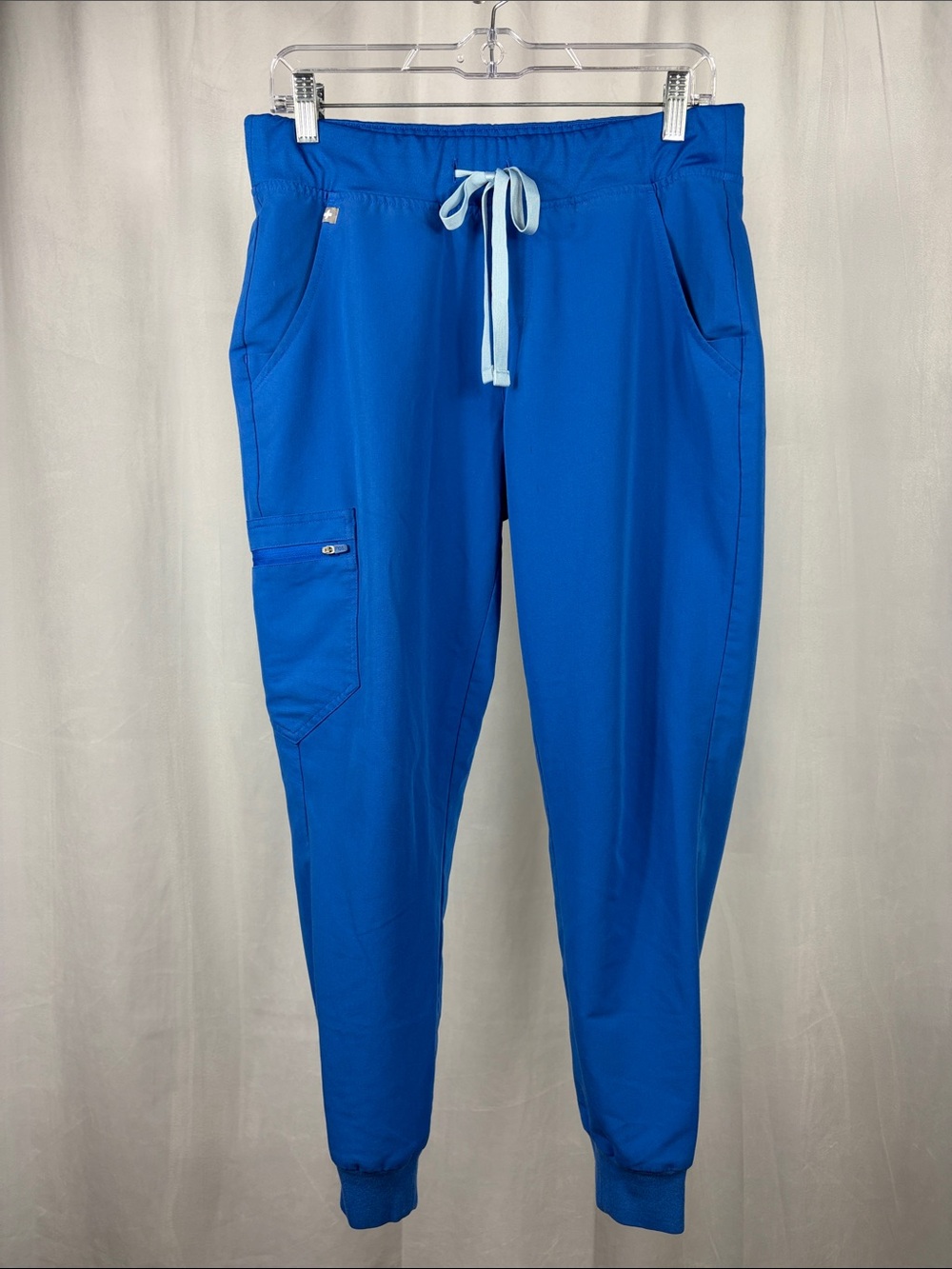 FIGS Women's Zamora Jogger Scrub Pant in Royal Blue.